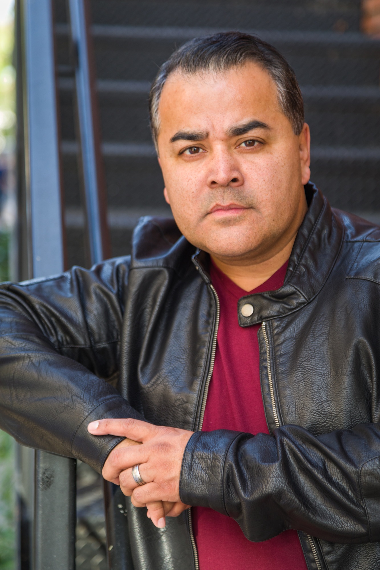 Headshot Portrait of Handsom Hispanic Man.